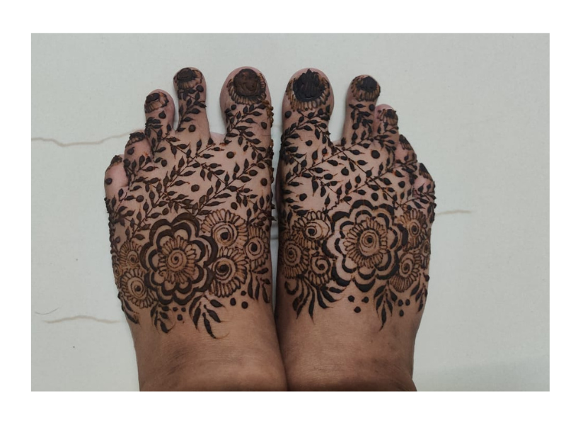 Intricate Mehndi designs created by students at Rose Fashion School